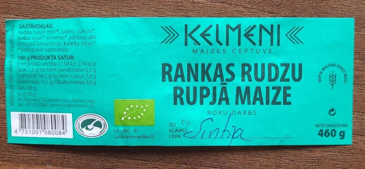 Fotografie - Rankas Rudzu Rupjā Maize Ķelmēni