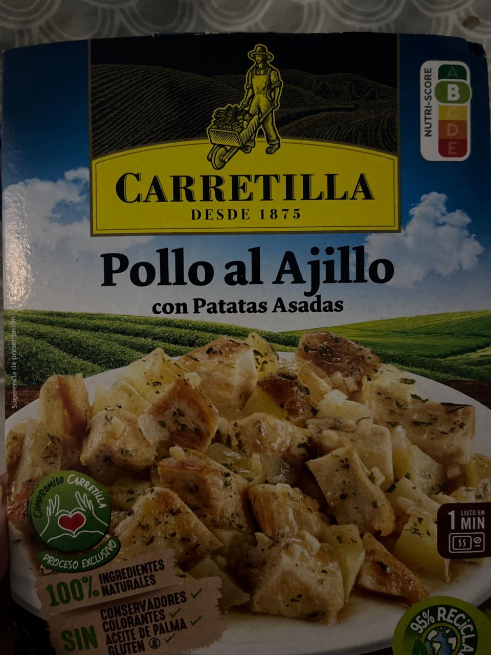 Fotografie - Pollo al ajillo con patatas asadas Carretilla