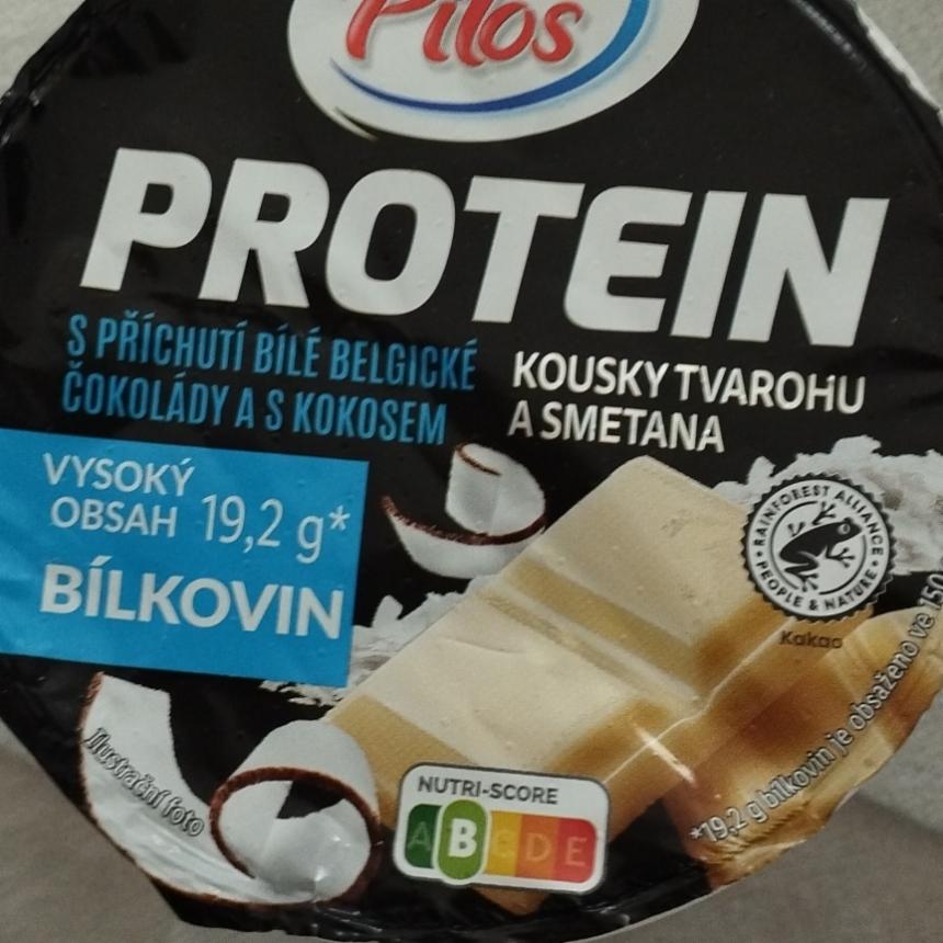 Fotografie - Protein kúsky tvarohu a smotana s príchuťou bielej belgickej čokolády a kokosom Pilos