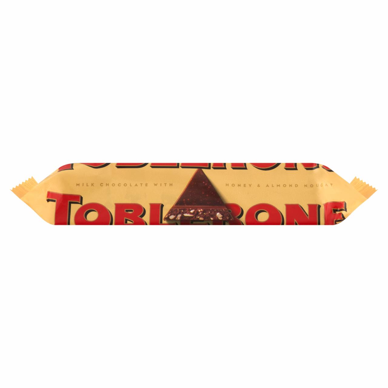 Fotografie - Swiss milk chocolate with honey and almond nougat Toblerone