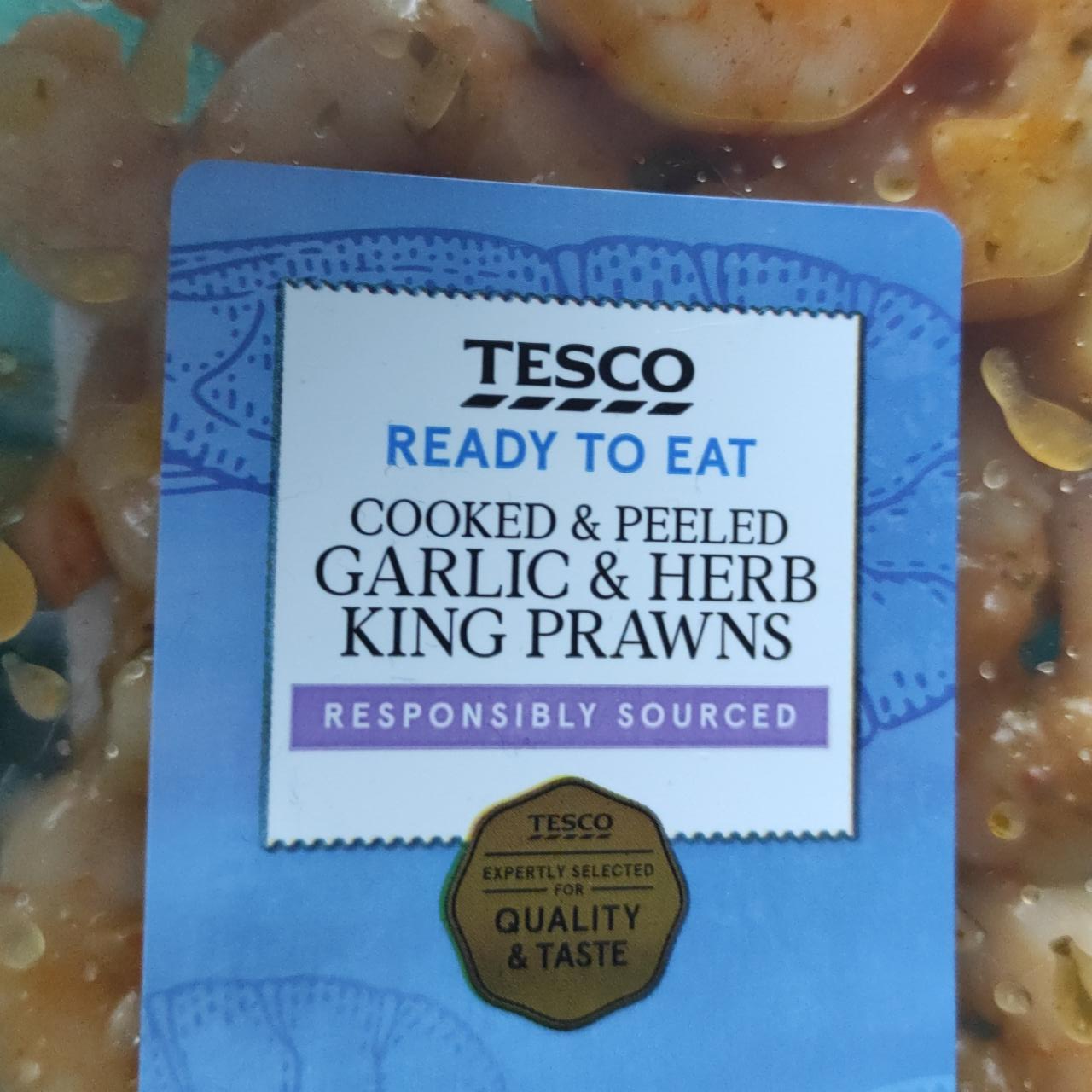 Fotografie - Cooked and peeled garlic & herb king prawns Tesco